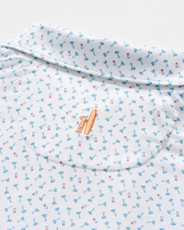 Close up of Johnnie-O Tini Dancer martini print performance polo fabric