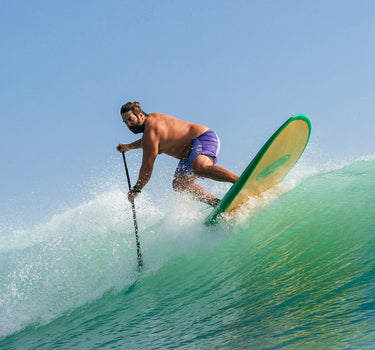Paddle surfer carving a cutback in Jupiter, Florida. Photo: Greg Panas