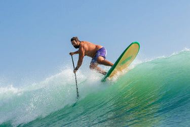 Paddle surfer carving a cutback in Jupiter, Florida. Photo: Greg Panas