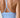Close-up back view of a woman wearing a light blue sports bra with crisscross racerback straps.
