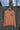 Front view of coral OG Logo Youth Hooded UV Sun Shirt from Blueline Surf & Paddle Co. featuring lightweight UPF performance fabric designed for fishing, boating, and outdoor adventures.