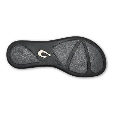 Durable rubber outsole on the OluKai Honu Black women's sandals designed for comfort and everyday traction.