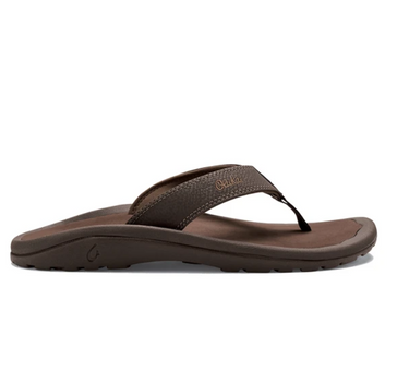 Side profile of OluKai ʻOhana sandals in Dark Java and Ray showcasing water-resistant straps, lightweight construction, and anatomically contoured footbed.