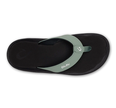 OluKai ʻOhana men's water-friendly sandals in seagreen and black featuring durable synthetic straps, anatomical footbed, and Wet Grip Rubber outsole for boating, beach days, and everyday coastal living.
