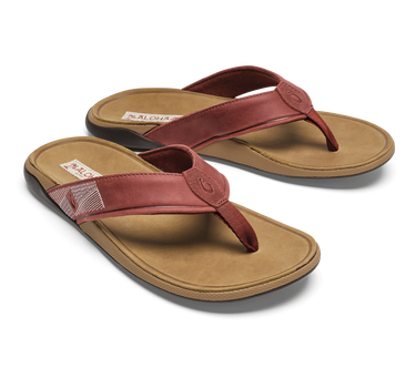 View of OluKai Tuahine sandals in Red Ochre and Tan designed for boating, beach days, travel, and everyday coastal living.