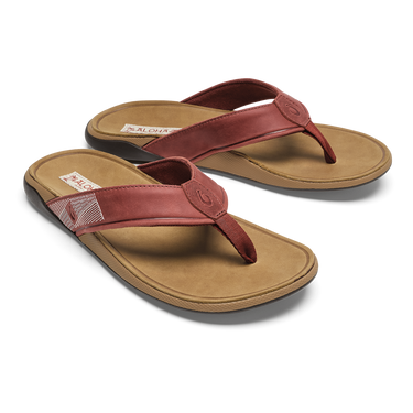 View of OluKai Tuahine sandals in Red Ochre and Tan designed for boating, beach days, travel, and everyday coastal living.