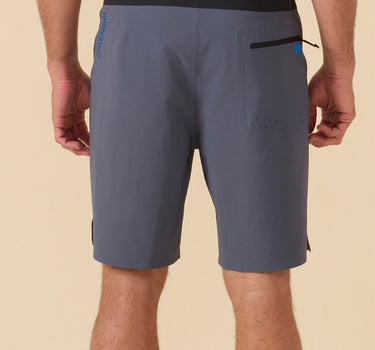 men wearing Outerknown Apex Evolution boardshorts back view surf and beach fit