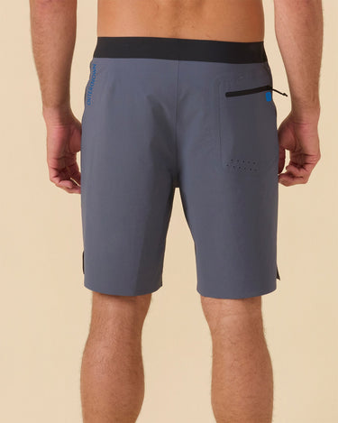 men wearing Outerknown Apex Evolution boardshorts back view surf and beach fit