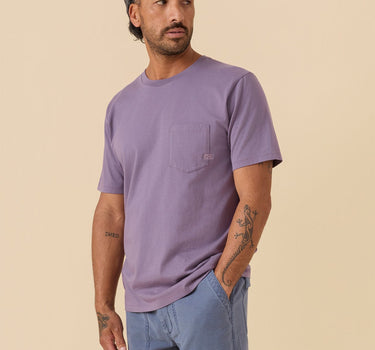 Man wearing Outerknown OK flag pocket tee organic cotton t-shirt in purple