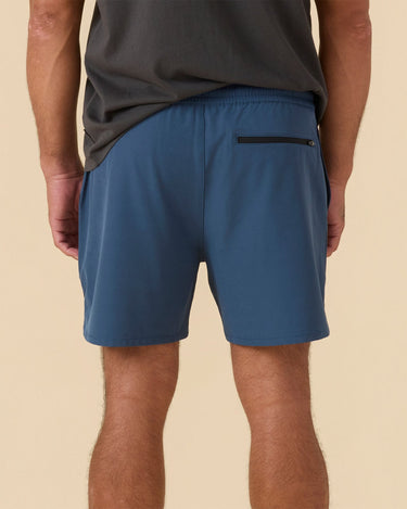 men wearing Outerknown stretch volley shorts back view relaxed fit beach shorts