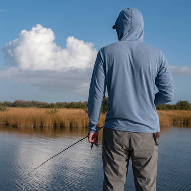 Poncho Blue Hole Bridge sun hoodie worn while fishing