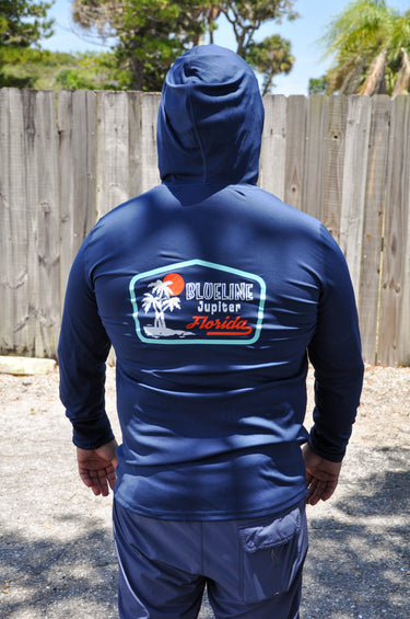 Back view of Rectangle Palm Hooded UV Sun Shirt Navy from Blueline Surf & Paddle Co. featuring palm-inspired coastal artwork and lightweight sun protection performance fabric.