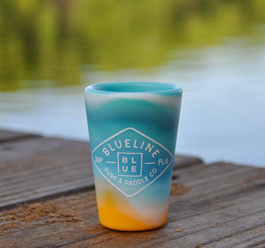 Silipint Silicone Shot Glass in shoreline featuring the Blueline Diamond Logo in durable, reusable food-grade silicone.