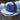 Slate gray and navy Skully rope trucker hat from Blueline Surf & Paddle Co. featuring custom skull artwork and coastal styling inspired by the Jupiter Florida saltwater lifestyle.