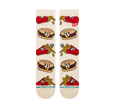 A pair of crew socks in a warm off-white/cream color, featuring a colorful cartoon pattern of burgers & french fries.