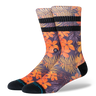 Stance Poipu crew socks with orange tropical floral print and black stripes
