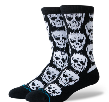 Stance Static Skull crew socks in black with all-over white skull graphics