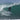 Surfer riding Surftech Aipa Dark Twinn shortboard on a clean wave