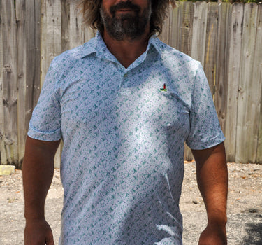 Front view of Vineyard Vines x Blueline Performance Lighthouse Polo featuring lightweight stretch fabric and custom lighthouse embroidery inspired by the Jupiter Florida coastal lifestyle.