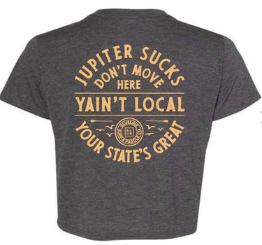Women’s Jupiter Sucks crop tee dark heather grey with small chest logo by Blueline Surf and Paddle in Jupiter Florida